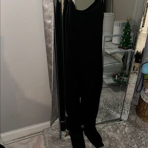 Elegant Black Jumpsuit shapes the body